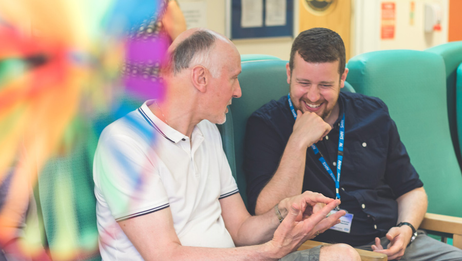 MS nurse with patient